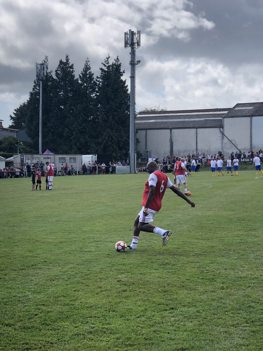 hornemuppet's tweet photo. @piersmorgan stood in the rain watching @Arsenal charity X1 team play @ChardTownFC in aid of a great charity single yellow rose #teambelle this Arsenal line up isn’t letting you down currently winning https://t.co/oD123oCGON