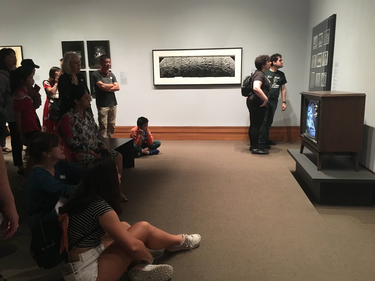BrianFloca's tweet photo. Finally made it to see #MetApollosMuse at @metmuseum yesterday. Beautiful photos, beautiful drawings, yes, yes—but what really caught me with my defenses down was Cronkite and the landing on a period television, and the people watching. It's a bit of magic. #Apollo50 #Apollo50th https://t.co/ofCZQ9J5tO
