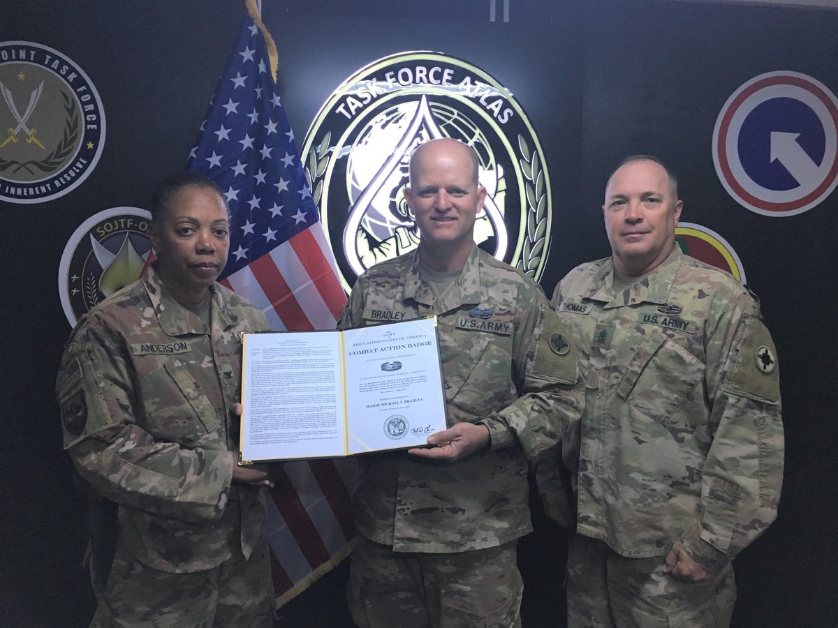 184thESC's tweet photo. Maj. Michael Bradley, 184 ESC, is presented the Combat Action Badge award certificate for actions and service during Operation Iraqi Freedom II in Iraq in 2004 by Col. Cheryl Anderson and Sgt. Maj. John Thomas at Erbil. @1stTSC @usarmycentral https://t.co/PgsDsG5FcB