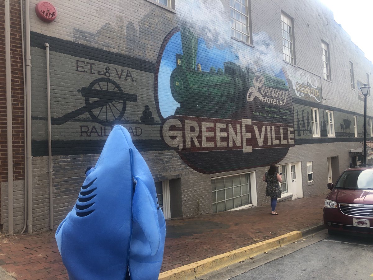 discover_greene's tweet photo. Sammy the Shark loves our #mural downtown! Stop by on Depot Street and take a selfie with the train and post it here! #Sharkation2019GreenevilleTN https://t.co/85eZk67r4x