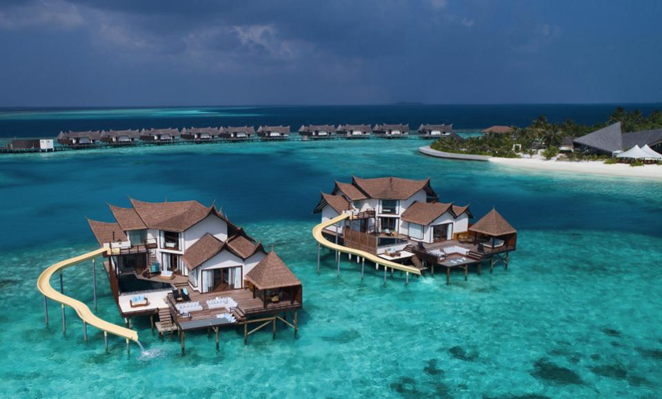 Forbes's tweet photo. 5 adventurous resorts that have waterslides straight into tropical lagoons, lakes and rivers: https://t.co/SHRG0AoHBl https://t.co/Xh8mcNB2IX