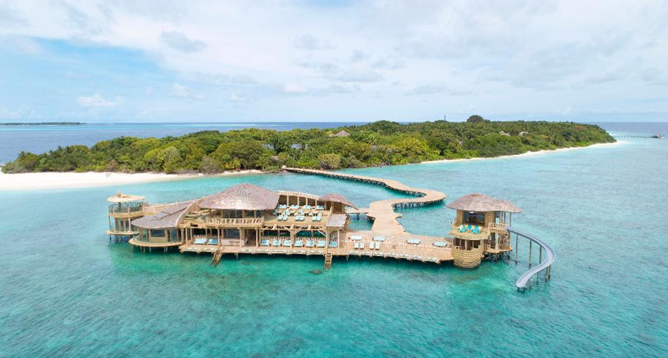 Forbes's tweet photo. 5 adventurous resorts that have waterslides straight into tropical lagoons, lakes and rivers: https://t.co/SHRG0AoHBl https://t.co/Xh8mcNB2IX