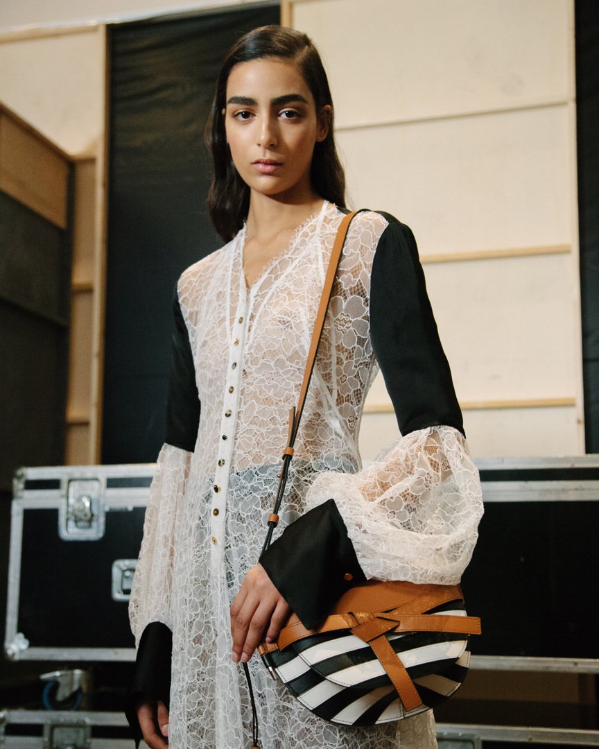 LoeweOfficial's tweet photo. As seen backstage at #LOEWEFW19 Womens show, strong monochrome stripes bring a nautical influence to our iconic #GateBag.
Now available in store and on https://t.co/V7jZ2gc8SM
#LOEWE https://t.co/bNHnIDinuy