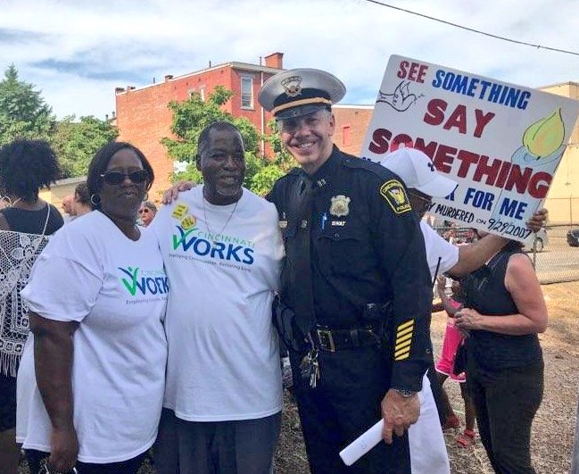 CincyPD's tweet photo. @CincyPD joins the Stop The Violence rally in Lower Price Hill as many join hands across the Eighth Street viaduct. #KeepingCincySafe https://t.co/KTwN1s7Q2m