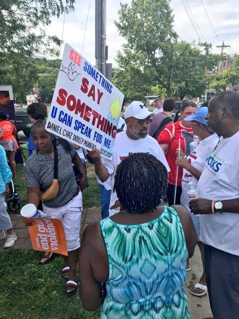 CincyPD's tweet photo. @CincyPD joins the Stop The Violence rally in Lower Price Hill as many join hands across the Eighth Street viaduct. #KeepingCincySafe https://t.co/KTwN1s7Q2m