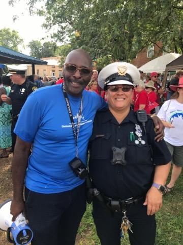 CincyPD's tweet photo. @CincyPD joins the Stop The Violence rally in Lower Price Hill as many join hands across the Eighth Street viaduct. #KeepingCincySafe https://t.co/KTwN1s7Q2m