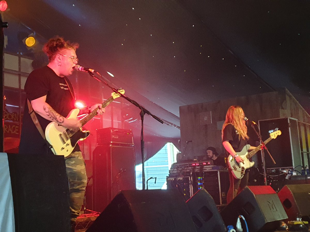 Cerprice's tweet photo. Nipped off to catch @MILKTEETHPUNX play #DissOrderAlley at @BoomtownFair.
Reminded me of my early teens...a lot of the American indie/garage sounds I was into back in the early '90s.
Also, LOVE the guitarist. Really enjoyed his style and sound.
#FuckBoris #MilkTeeth https://t.co/7e6vyaJwA7