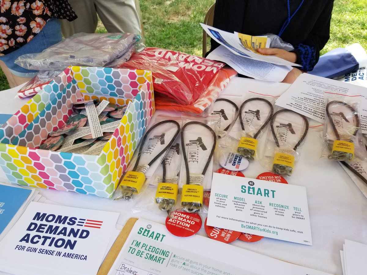 JustCallMeFoxy's tweet photo. #Charlottesville @MomsDemand signed up new volunteers, gave out gun locks & had signed posters of solidarity for communities reeling from gun violence. @UnityDaysCville #UnityDaysCville https://t.co/wL5B3RsGD3