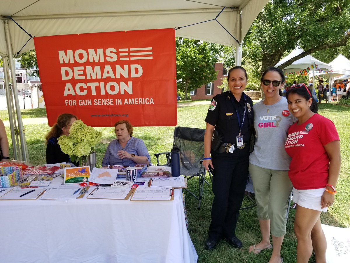 JustCallMeFoxy's tweet photo. #Charlottesville @MomsDemand signed up new volunteers, gave out gun locks & had signed posters of solidarity for communities reeling from gun violence. @UnityDaysCville #UnityDaysCville https://t.co/wL5B3RsGD3