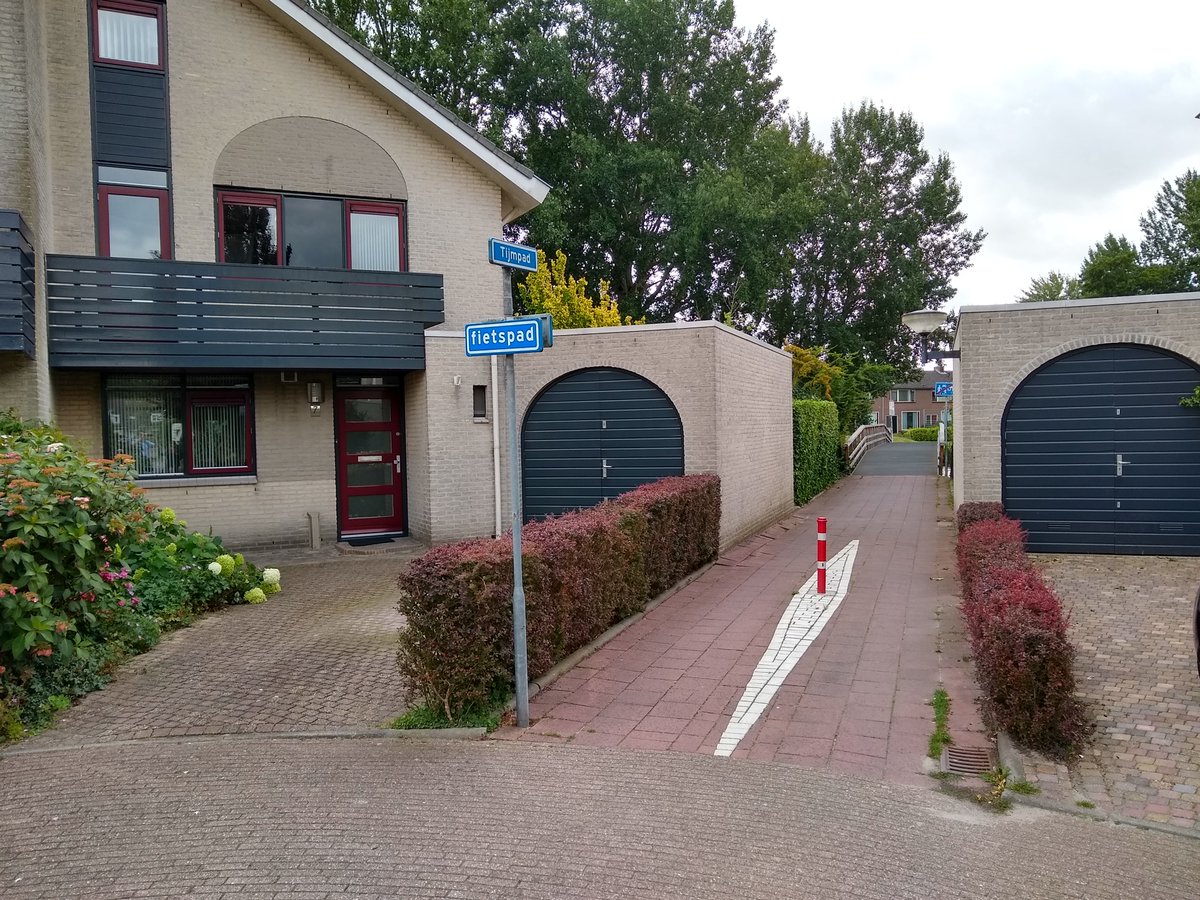 Modern Dutch housing developments have cut-throughs at the end to give people on bikes the shortest way out. Exact opposite of UK practice
