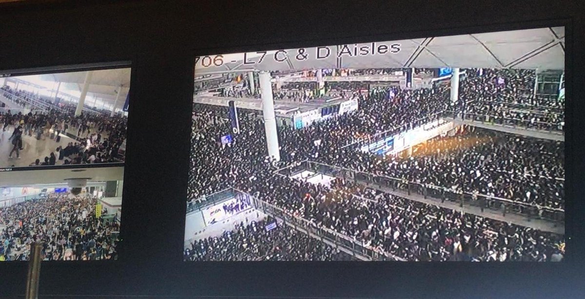 percylurcher's tweet photo. Not sure the cops firing rubber bullets at point blank range at peoples heads is working. This is the airport now. #Hongkongprotest #hongkongairport https://t.co/Yb08xmQWRo