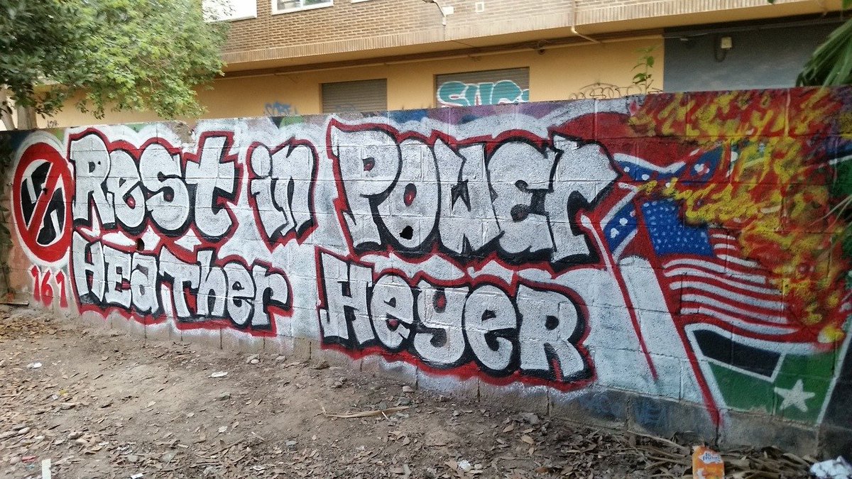 GraffitiRadical's tweet photo. Solidarity mural in Valencia, Spain, for Heather Heyer, an anti-fascist protester murdered in a nazi attack in Charlottesville, Virginia on the 12th of August 2017.

Never forgive, never forget.

#Charlottesville #heatherheyer #ripheatherheyer #antifa #valencia https://t.co/qU4xv2ZTYh