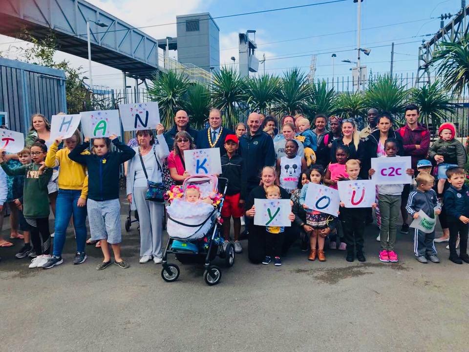 emrgroupltd's tweet photo. We’re proud to work closely with @OneCommunity and had a great time as their guest of honour waving goodbye to 350+ Tilbury residents with Tilbury Mayor, Terry Piccolo. They took a private train to Southend on Sea for the day, organised by One Community. https://t.co/F35faL6Zk0