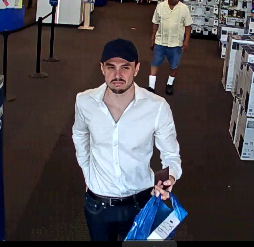 HCSOSheriff's tweet photo. The pictured individual, used the victim's bank cards at the Brandon Best Buy and Brandon Buy Buy Baby and fraudulently purchased $4,712.49 in goods. The suspect is wanted for credit card fraud and identity theft. If you recognize this person, please call HCSO at 813-247-8200. https://t.co/kwmEtCH678