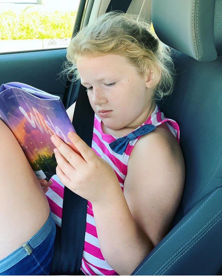 fitzbtwnshelves's tweet photo. Kendall is so ready to join her fellow #stabsummerreading friends as a new student this year, she already got a head start on reading her way through our library! Welcome to @StAnnesBelfield, Kendall! You’re gonna fit right in! 👋🏽 https://t.co/OmBzAFwEqV