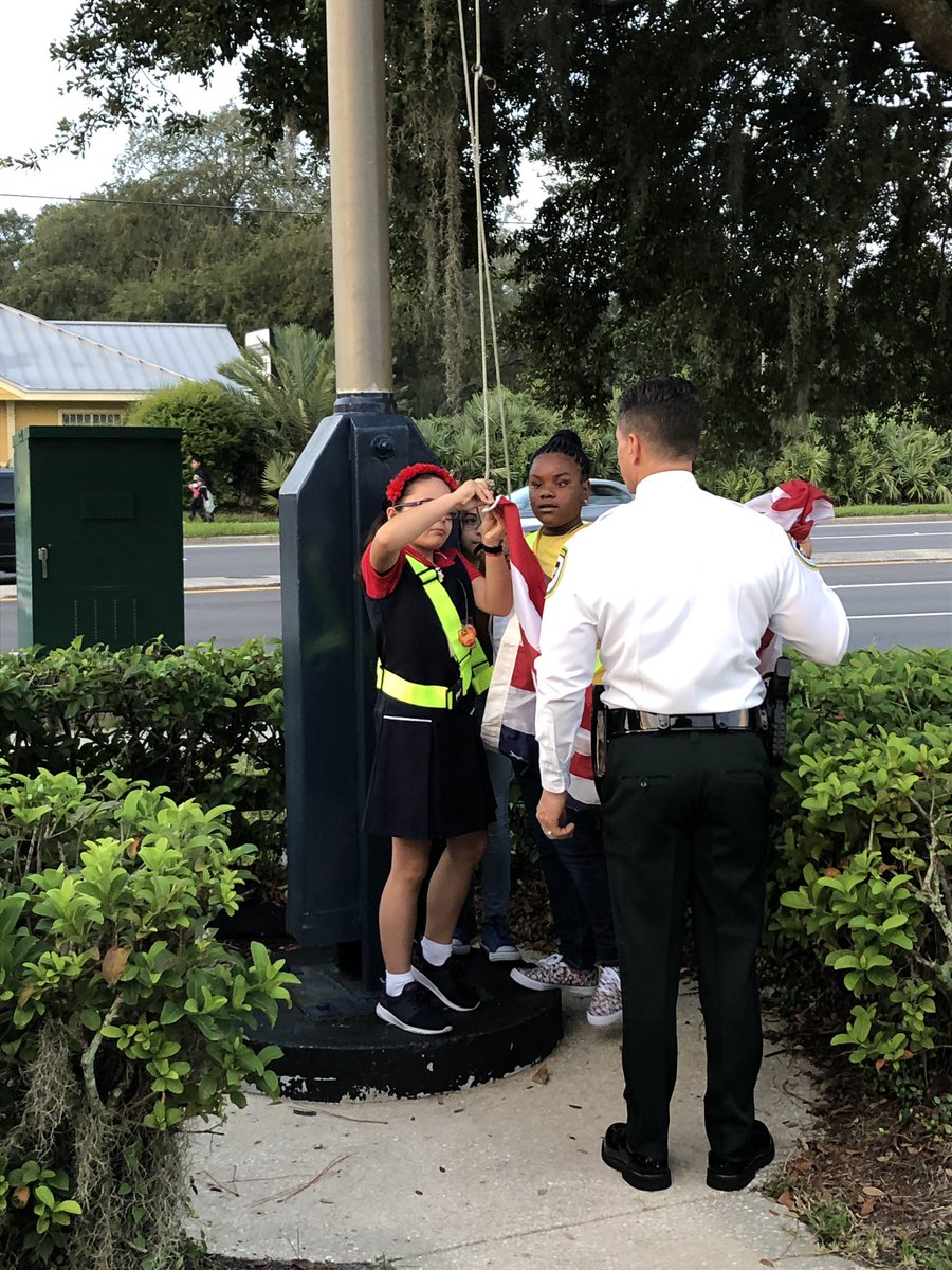 SquadMort's tweet photo. @HCSOSheriff @MortElementary Thank you Sheriff Chronister for helping the new, nervous patrols raise the flag on the 1st day of school. #LeadByExample @AchievementSch @Jeff_Eakins @mfitzgerald44 @Clstuart 
#WeAchieveTogether @MortFamilies https://t.co/QtwlwBlF2B