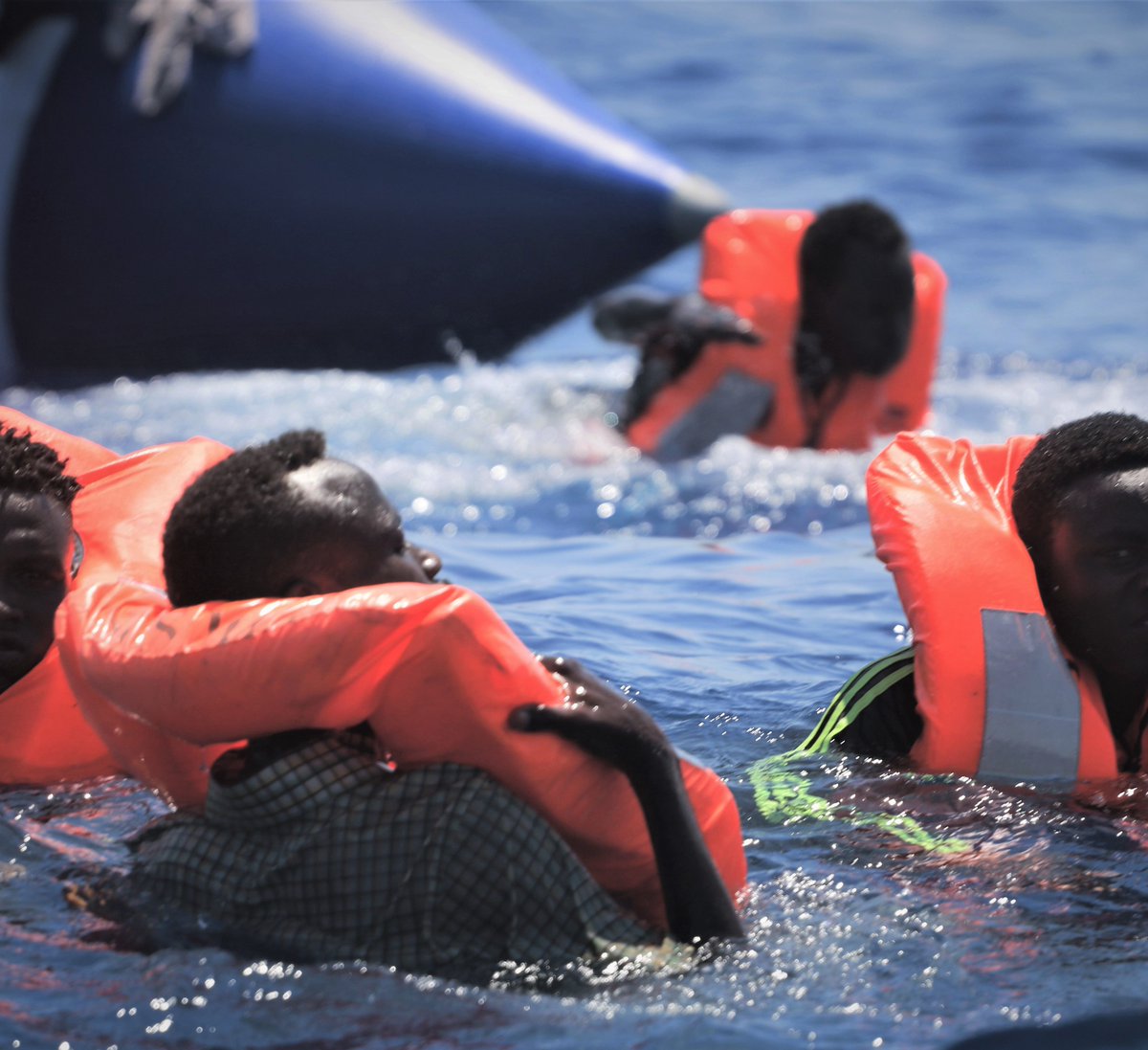 MSF_Sea's tweet photo. BREAKING: @SOSMedIntl and @MSF_Sea just completed a critical rescue. Minutes after lifejackets were distributed, a rubber tube on the fragile boat burst, causing people to fall into the water. All 105 people are now safely on the #OceanViking, where the total onboard is now 356. https://t.co/l9uXmhRv9u