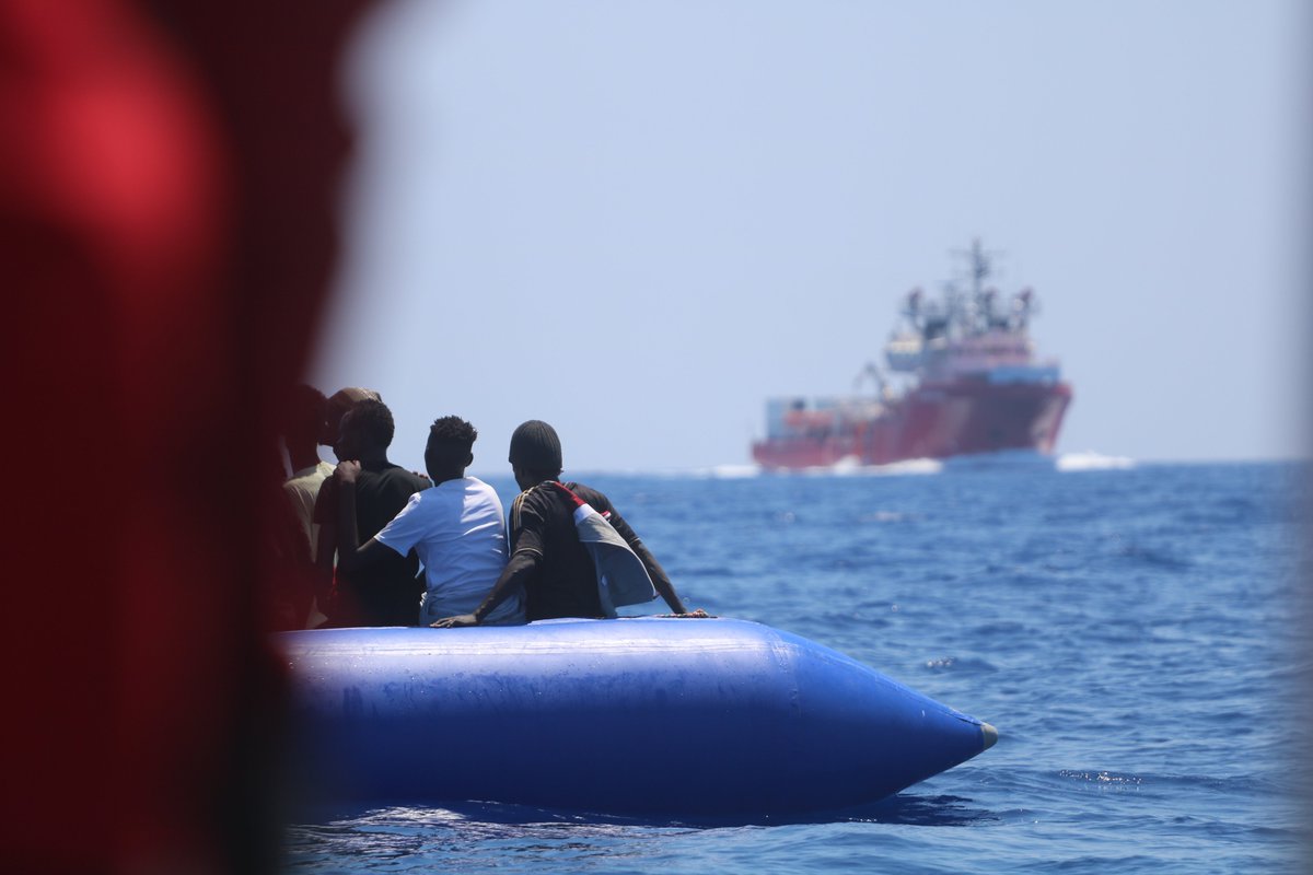 MSF_Sea's tweet photo. BREAKING: @SOSMedIntl and @MSF_Sea just completed a critical rescue. Minutes after lifejackets were distributed, a rubber tube on the fragile boat burst, causing people to fall into the water. All 105 people are now safely on the #OceanViking, where the total onboard is now 356. https://t.co/l9uXmhRv9u