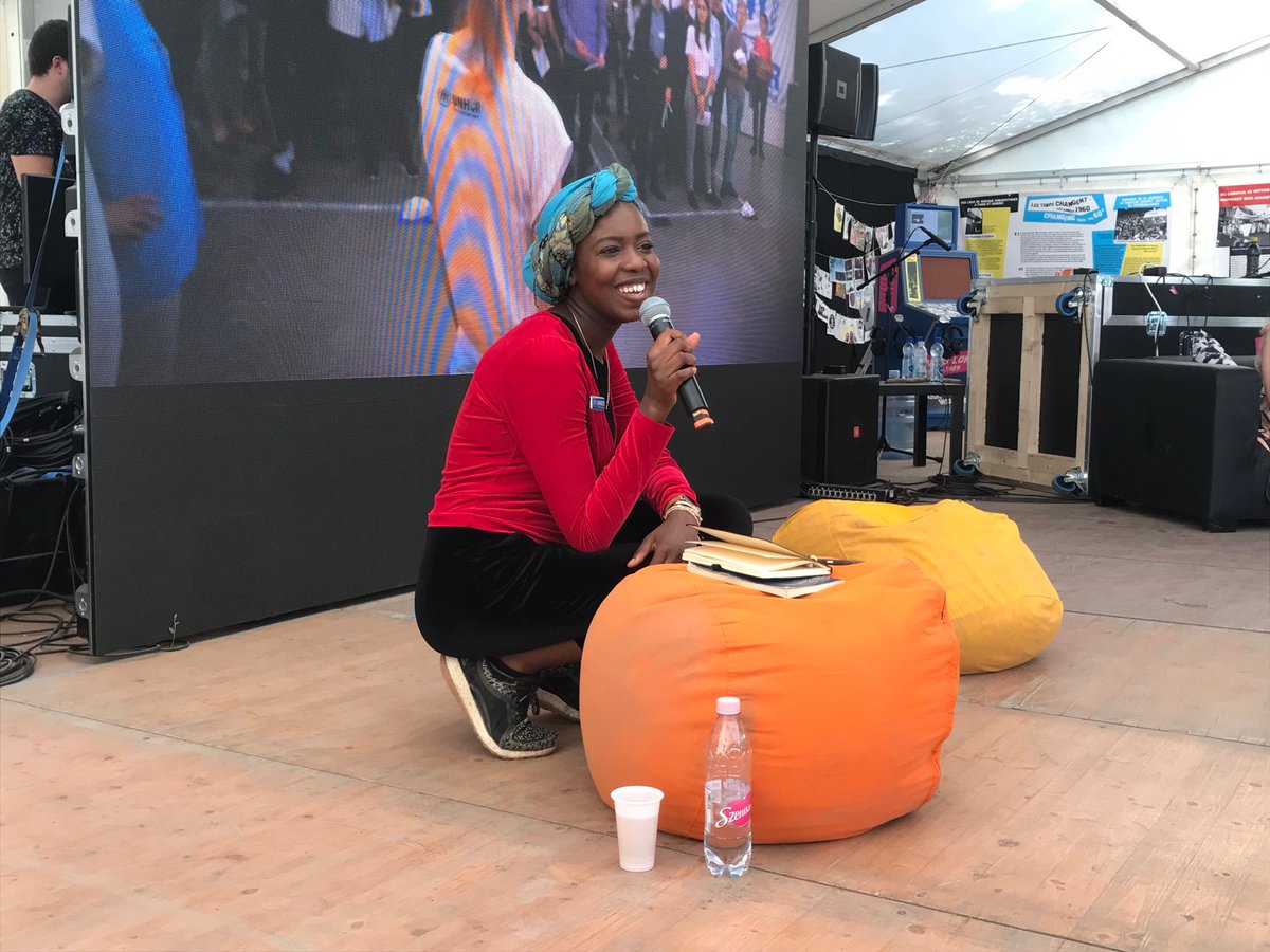 Embrrrr's tweet photo. UNHCR Goodwill Ambassador and 2015 Individual World Poetry Slam Championship winner Emi Mahmoud @EmiThePoet has charmed the audience at her workshop in the #TentWithoutBorders of #SzigetFestival @szigetofficial.
If you’ve missed her can still see her at 7pm on the MAIN STAGE! https://t.co/ZyBb0lliBt
