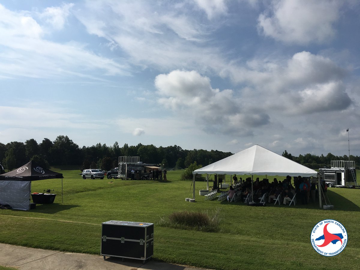 NCAviation's tweet photo. This morning's flight demo involved a simulated flood situation, where attendees were able to learn about communications between manned and unmanned aircraft operations. Catch more flights out on the lawn all throughout the #NCDroneSummit https://t.co/8SaAJ7nDWP