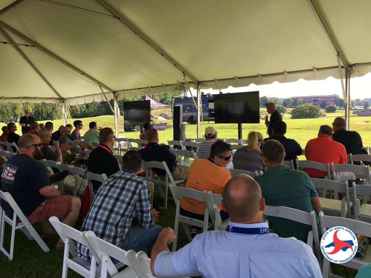 NCAviation's tweet photo. This morning's flight demo involved a simulated flood situation, where attendees were able to learn about communications between manned and unmanned aircraft operations. Catch more flights out on the lawn all throughout the #NCDroneSummit https://t.co/8SaAJ7nDWP