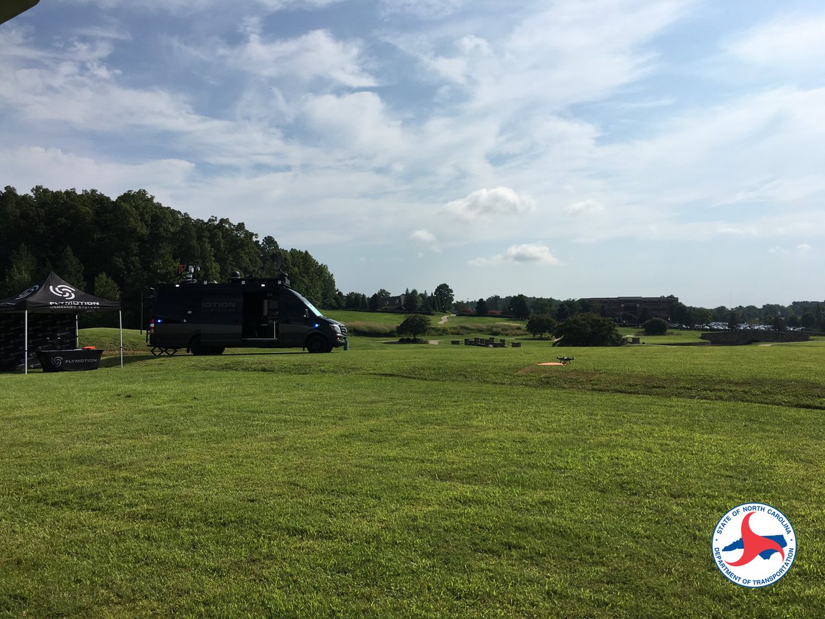 NCAviation's tweet photo. This morning's flight demo involved a simulated flood situation, where attendees were able to learn about communications between manned and unmanned aircraft operations. Catch more flights out on the lawn all throughout the #NCDroneSummit https://t.co/8SaAJ7nDWP