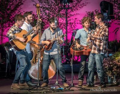 If you savor the sounds of acoustic instrumentation, enjoy energetic live performances, and delight in the creation of original songs, then join us for an engaging evening in the acoustic perfection of In Your Ear’s Studio A with the Fireside Collective on Wednesday, September 25