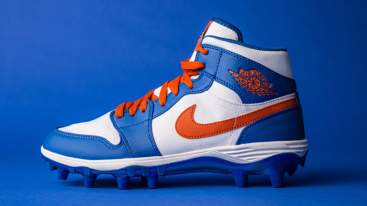 orange jordan cleats