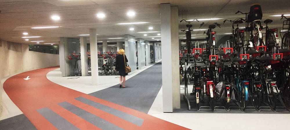 Utrecht Train Station's brand new bike parking opens Aug 19. It will have 12,500 bike parking spaces covering 17,000m². 

Apple HQ opened in 2017. It has 11,000 car parking spaces covering 325,000m².

Who is building the smart city, again?