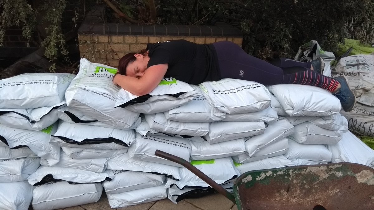 BaterseaGardens's tweet photo. A few more pics from this evening - a superb effort! Thank you @GGWandsworth...and a well deserved little rest under the watchful eye of the #snail on the wheelbarrow! #Battersea #Community #compostchallenge https://t.co/0GPAHsjHlB