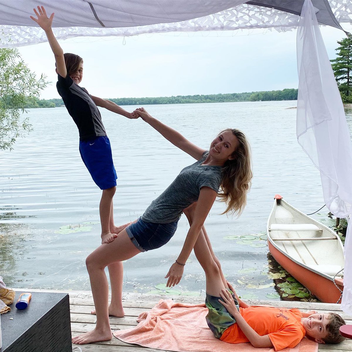 Tracy_Espinola's tweet photo. Day 50... ten more days...wowza!  Family dock yoga and hours of paddling! I was on the SUP so no pics:) too risky with a phone. Loving the cottage! #60x60Challenge https://t.co/MnlpkIJ3B9