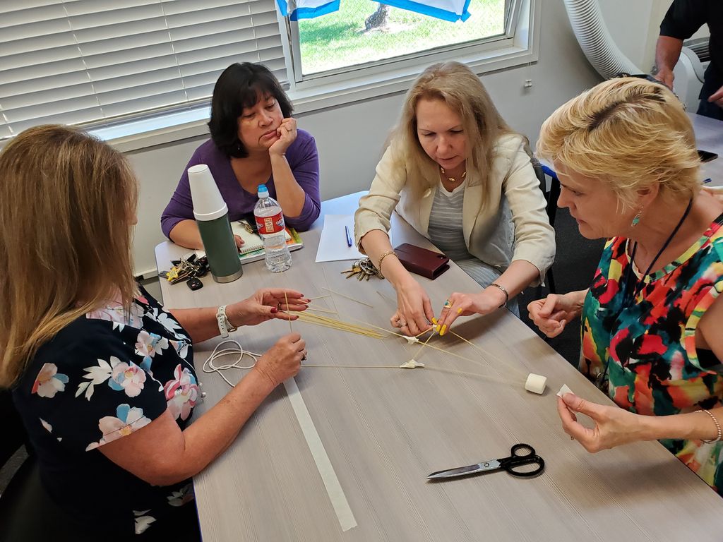 SimiInstitute's tweet photo. The #MarshmallowProject was an amazing #teambuilding lesson about preconceptions and prototyping for our staff today. #Welding #MachineTech and #DentalTech all had the advantage with their engineering skills, but #Cosmetology won. https://t.co/QBUd6w1JaX https://t.co/EjlHap1MRj