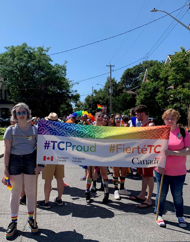 Transport_gc's tweet photo. #ICYMI: We showed up to the #Ottawa #FierteCapPride Parade in style yesterday! 😎 To show our support for #OttPride and our commitment to reduce #GHG emissions, we showcased one of our new zero-emission vehicles at the parade. Learn more about #ZEV: https://t.co/FVrIZ4HwJr https://t.co/bMy9jf8rGL