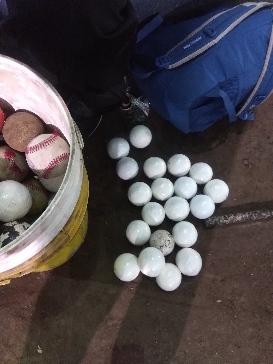 MarceAlfonsin's tweet photo. This is how we save money while trying to develop baseball in Argentina. Using electrical tape to recycle used and banged up balls. Some of these are already on their 3rd round of taping. We use this for hitting in the cage mostly. https://t.co/eiDzCR9BkB