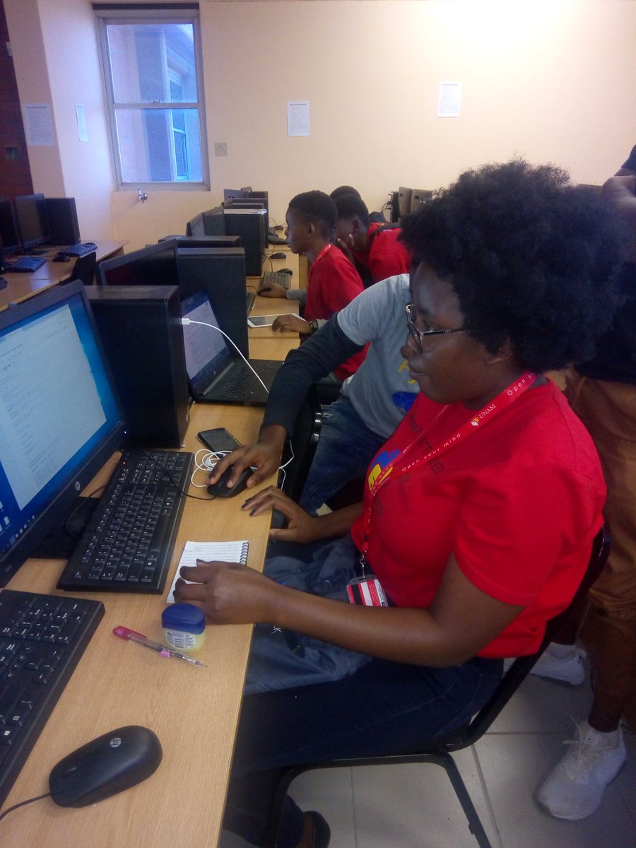 PythonNamibia's tweet photo. Participants working on their projects.#PythonWeekOfCode2019 @rgaiacs @JessicaUpani @muheuenga @KaveUno @ngatatuemate https://t.co/VF8Olgw7cF