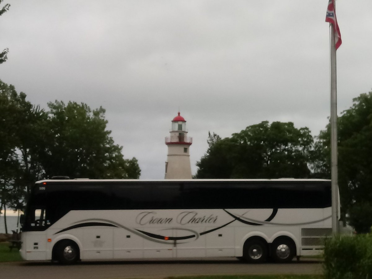 charter_crown's tweet photo. Good morning from Marblehead Lighthouse! @OhioStateParks A few clouds won’t detract from the beauty of this state park! #tour #travel #stateparks #bus https://t.co/6kRLJ5vYL9