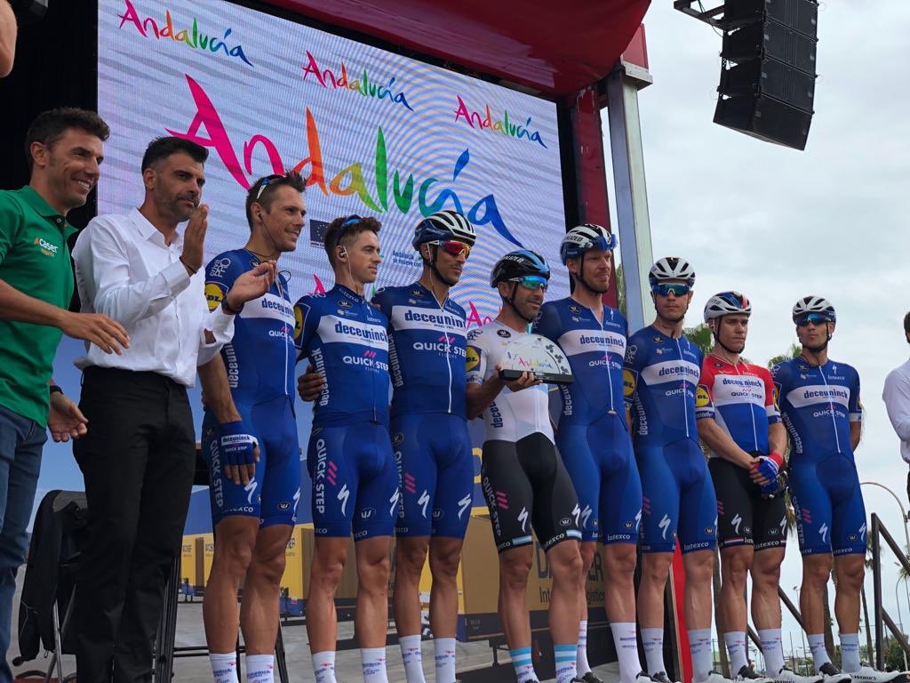 soudalquickstep's tweet photo. On the podium before the start to receive the prize for the best team on #LaVuelta19 stage 3 😃
#TheWolfpack https://t.co/6rDzQEaiCD