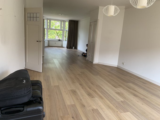 Sitting on the floor of our living room, waiting for our furniture to be delivered.  No fans or A/C,<a href="/tag/joker"class="tags"><span>#joker</span></a>