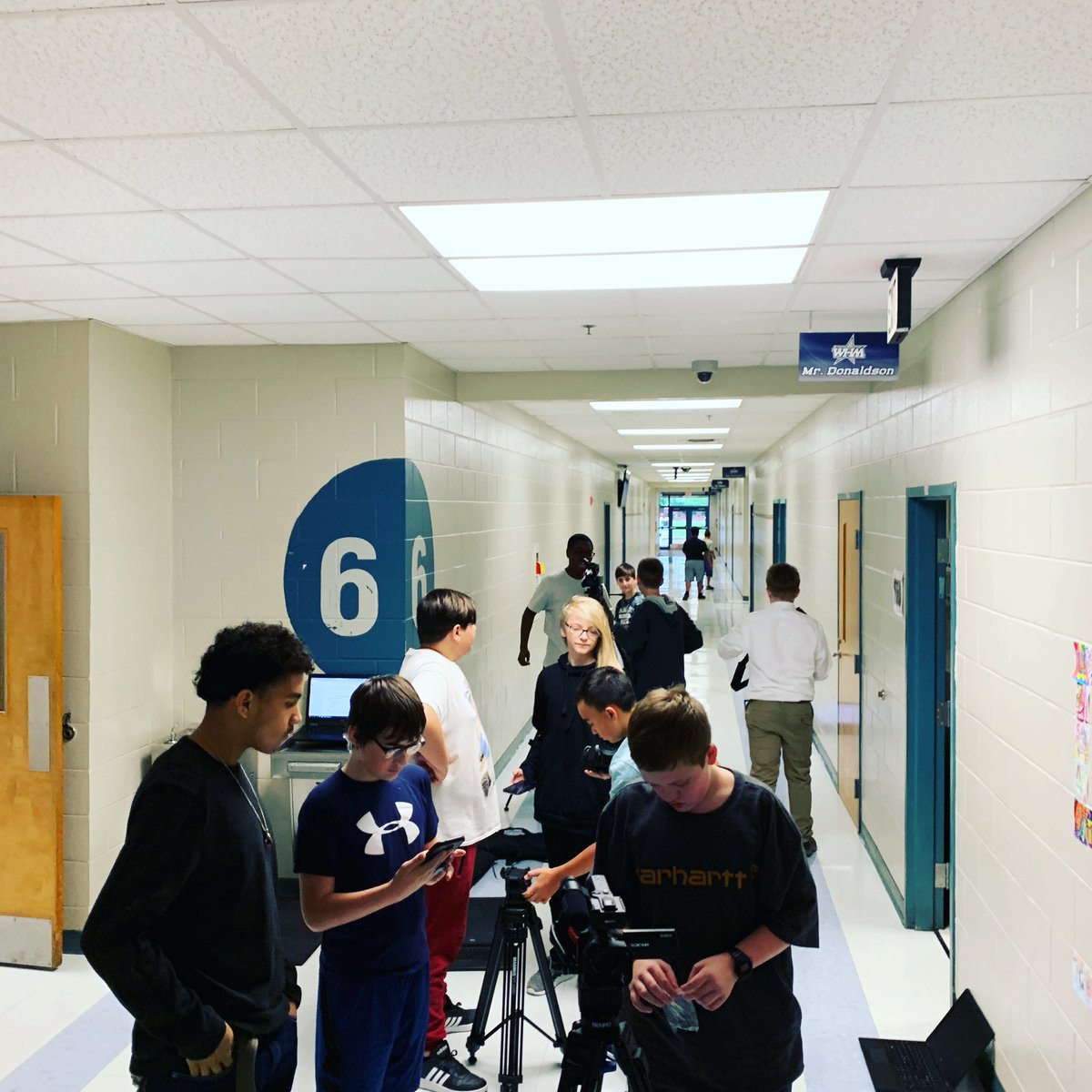 WHMS_News's tweet photo. .@westhallmiddle Students learning how to operate cameras and tripods #whms #spartans https://t.co/uD4Xf693XF