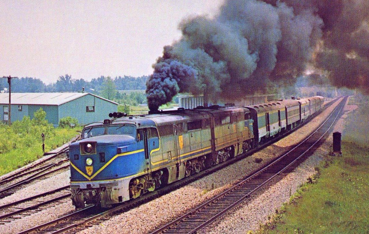 americanrails's tweet photo. A pair of Delaware &amp; Hudson's PA's depart northbound from Saratoga Springs, New York with the "Laurentian" en route to Montreal during the 1970s. Carl Sturner photo. https://t.co/oRETRiYUj8