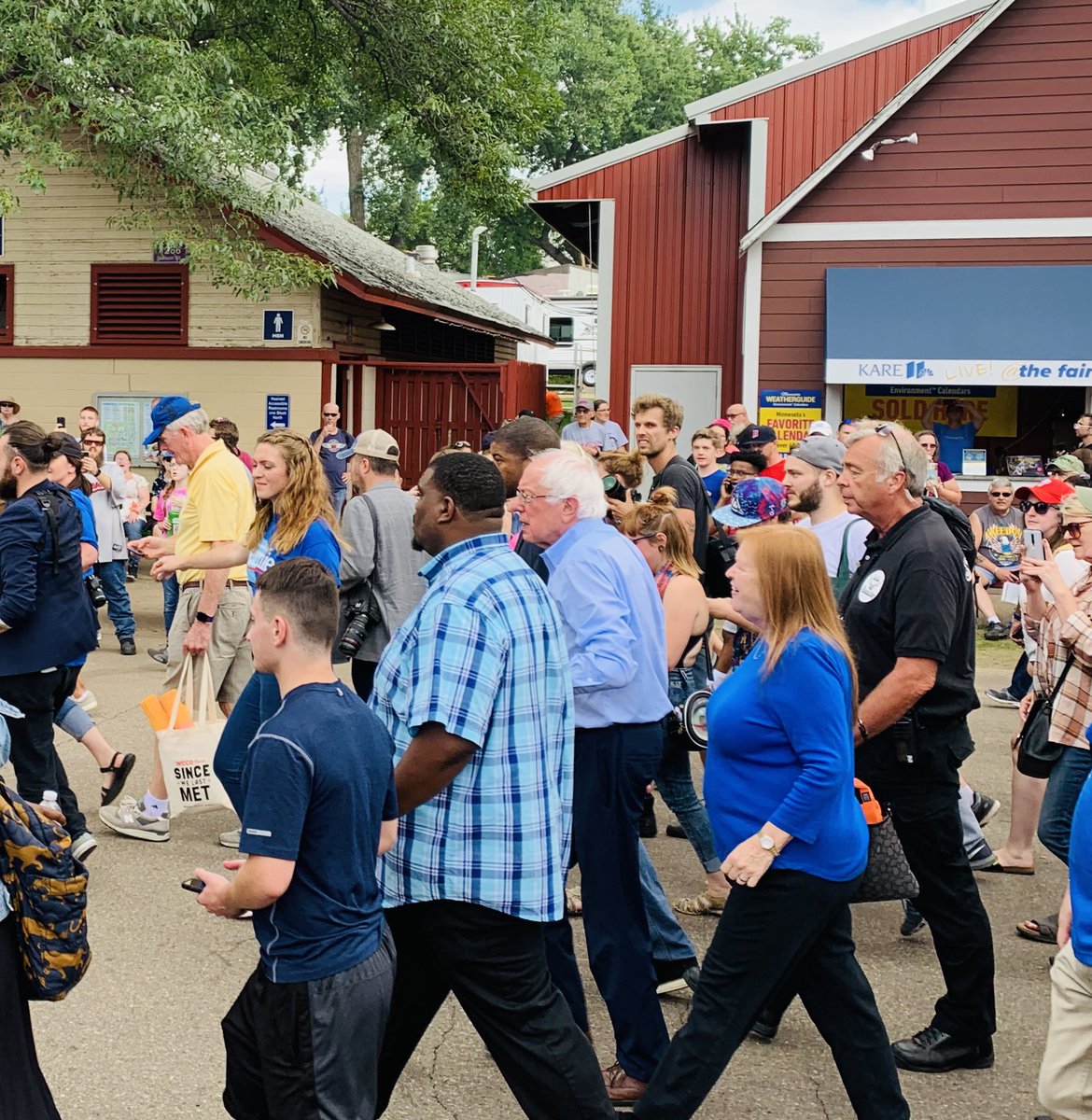 mark_row's tweet photo. You never know who you’ll bump into at the MN state fair. #FeelTheBern https://t.co/oNeXga7EwG