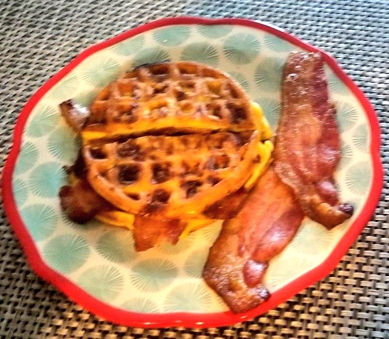 RobbieTheGeek's tweet photo. This morning we made #chaffle for the first time!  Amy had grilled cheese with bacon and I had open faced egg and bacon sandwiches. #keto #glutenfree #homechef #geekchef https://t.co/R78fRVent7
