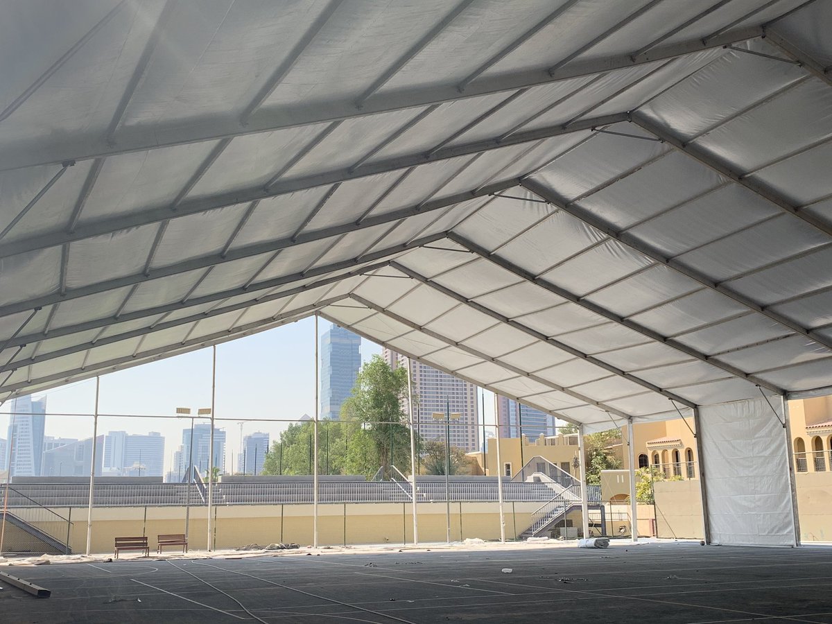 DubaiCollege's tweet photo. The Sports Hall is coming down and our new temporary indoor facility is taking shape. @DCol_Sport #dcdevelopment https://t.co/oFL4GY5zu6