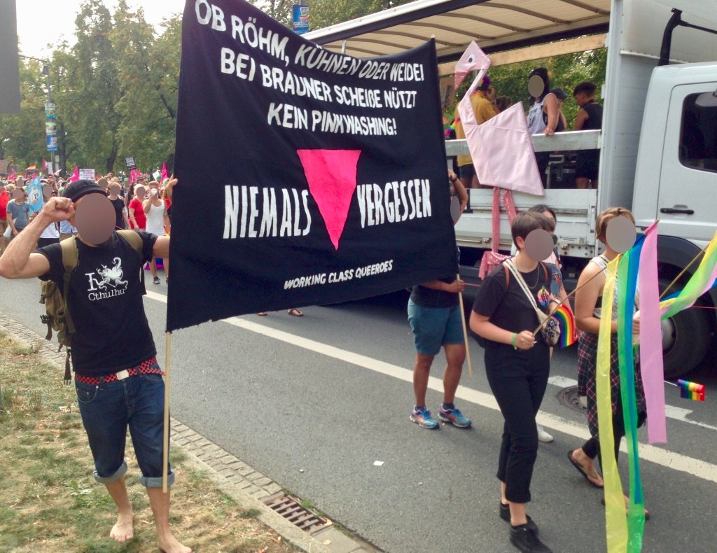 Xekola's tweet photo. "WHETHER RÖHM, KÜHNEN OR WEIDEL; WHEN IT COMES TO BROWN SHIT, PINKWASHING WON’T CUT IT – NEVER FORGET!" Working Class Queeroes @Unteilbar demo, Dresden Aug. 24 2019, that mobilized >35,000 people against the rise of #neofascism in #Germany |#NoAfD #AnarchaQueer #QueersBashBack https://t.co/RsiUTaejOm