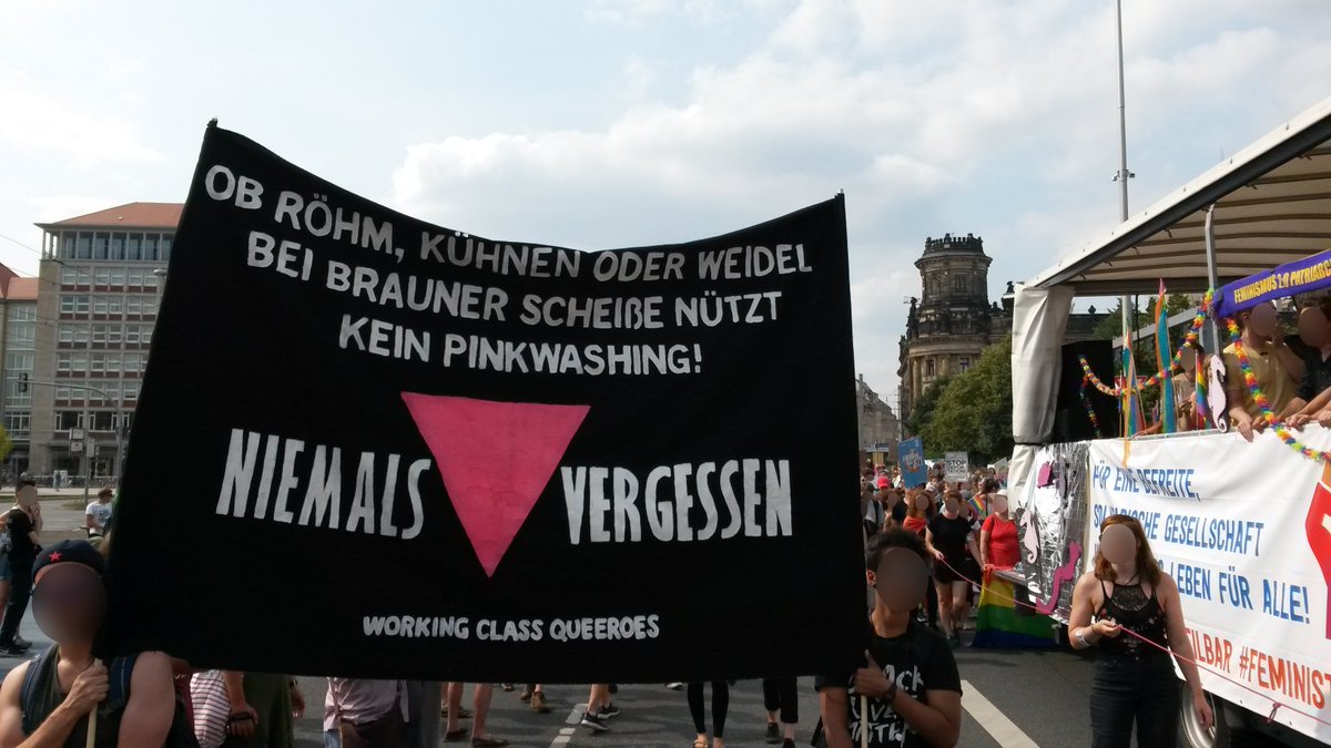 Xekola's tweet photo. "WHETHER RÖHM, KÜHNEN OR WEIDEL; WHEN IT COMES TO BROWN SHIT, PINKWASHING WON’T CUT IT – NEVER FORGET!" Working Class Queeroes @Unteilbar demo, Dresden Aug. 24 2019, that mobilized >35,000 people against the rise of #neofascism in #Germany |#NoAfD #AnarchaQueer #QueersBashBack https://t.co/RsiUTaejOm
