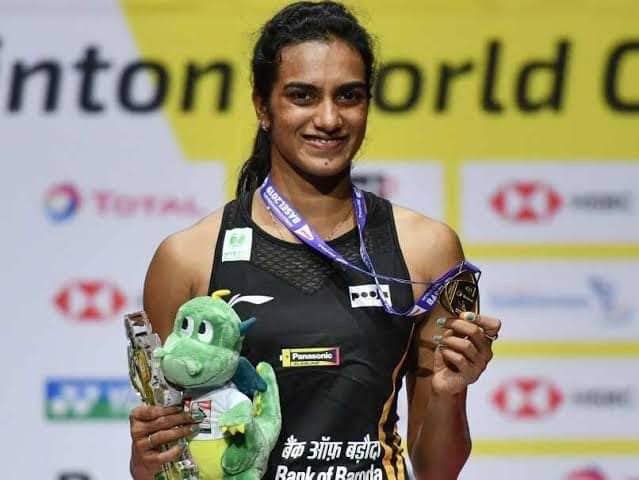 Praphoolam's tweet photo. Heartiest congratulations 
@Pvsindhu1
 for becoming the first-ever Indian to win the Gold at #BWFWorldChampionships2019. Indeed an inspiration and truly a historic moment for #India and in the world of sports.We are extremely proud of this remarkable achievement. https://t.co/VQUxzB3G5c