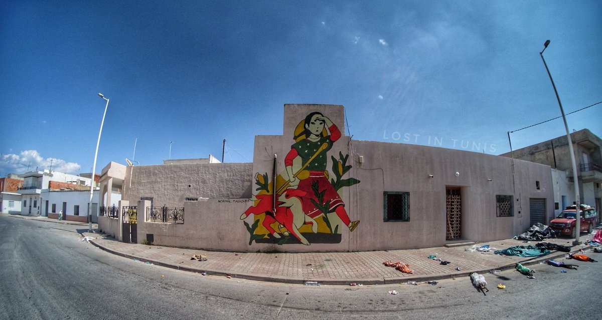 Fhtagn's tweet image. The artists #TARAZA draw giant fresques all around the city of #Tazarka of a Shepherdress looking for her lost sheep.. #Streetart #Tunisia