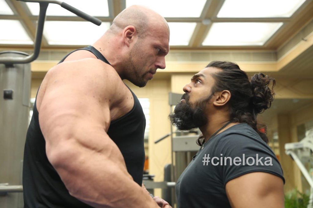 cineloka's tweet photo. ನಂದ ಕಿಶೋರ್ ನಿರ್ದೇಶನದ,ಆಕ್ಷ್ಯನ್ ಪ್ರಿನ್ಸ್ ಧ್ರುವ ಸರ್ಜಾ ಅಭಿನಯದ ಮೋಸ್ಟ್ ಎಕ್ಸ್ಪೆಕ್ಟೆಡ್ “ಪೊಗರು” ಚಿತ್ರದಲ್ಲಿ ಜಗತ್ಪ್ರಸಿದ್ಧ ಬಾಡಿ ಬಿಲ್ಡರ್ ಮಾರ್ಗನ್ ಅಷ್ಟೆ ನಟಿಸಿದ್ದಾರೆ.
#Pogaru #Cineloka #ActionPrince @DhruvaSarja #MorganAste https://t.co/WSqW5GVr11