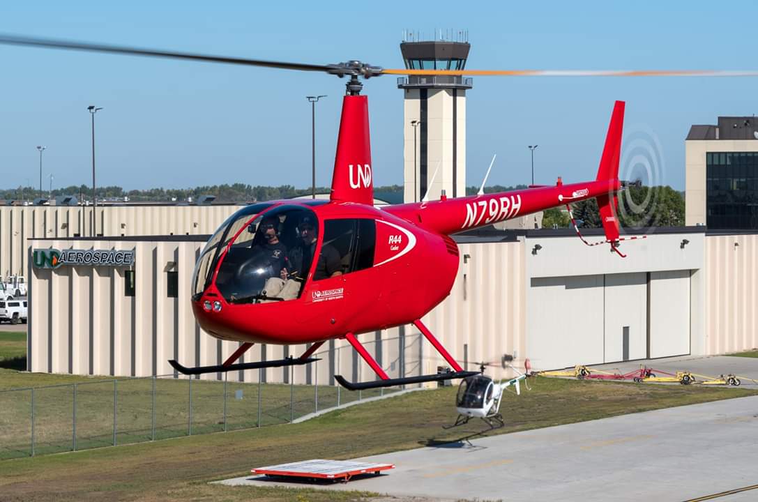 UND_Heli's tweet photo. Welcome back students!  We look forward to another exciting year at @UNDAerospace.  A reminder that flight training for the Fall semester begins today and classes start at 4pm!  #flyUND #UNDheli #helicopter #R44 @Robinson_Heli https://t.co/JQIgcOHcwl