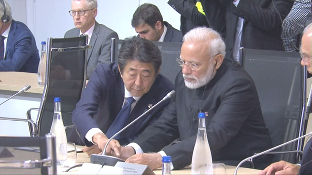 Looks Friendly As Pm Abe Of Japan Helps Pm Modi Of India Get His Translation Box On The Right Channel At G7 Working Lunch S Mark Knoller Scoopnest